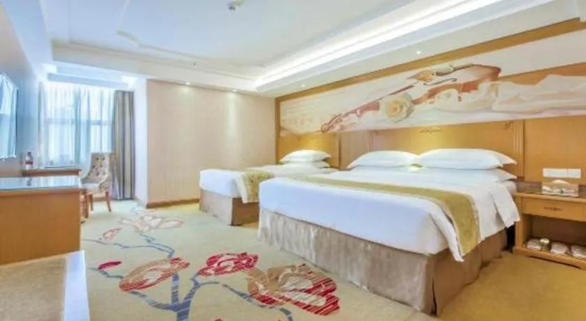Bed in Vienna Hotel Guangzhou Panyu Shiqiao Center Branch
