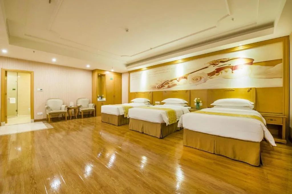 Bed in Vienna Hotel Guangzhou Panyu Shiqiao Center Branch