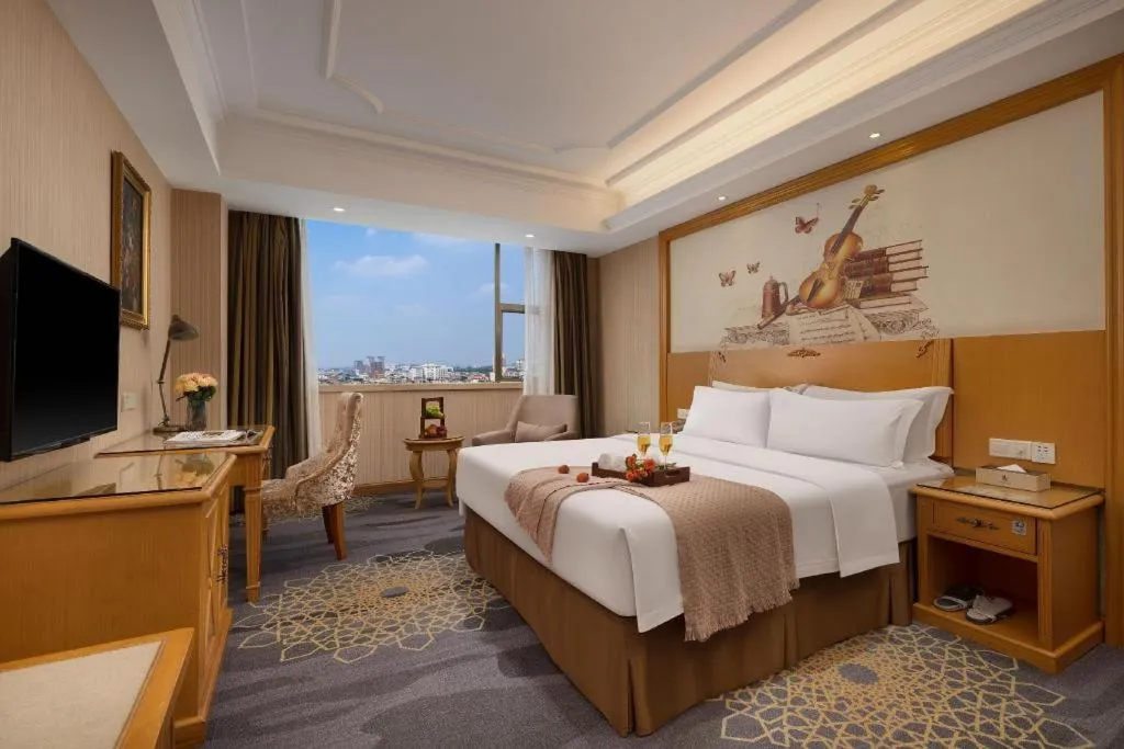 Bed in Vienna Hotel Guangzhou Panyu Shiqiao Center Branch
