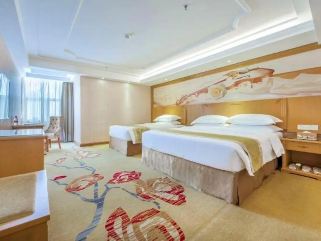 Bed in Vienna Hotel Guangzhou Panyu Shiqiao Center Branch