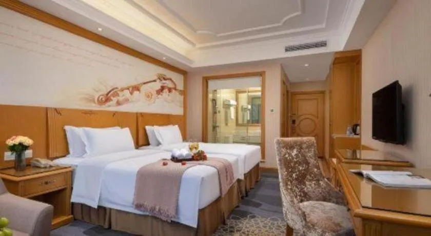 Bed in Vienna Hotel Guangzhou Panyu Shiqiao Center Branch
