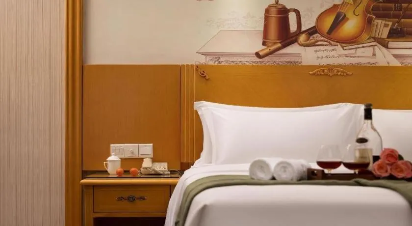 Bed in Vienna Hotel Guangzhou Panyu Shiqiao Center Branch