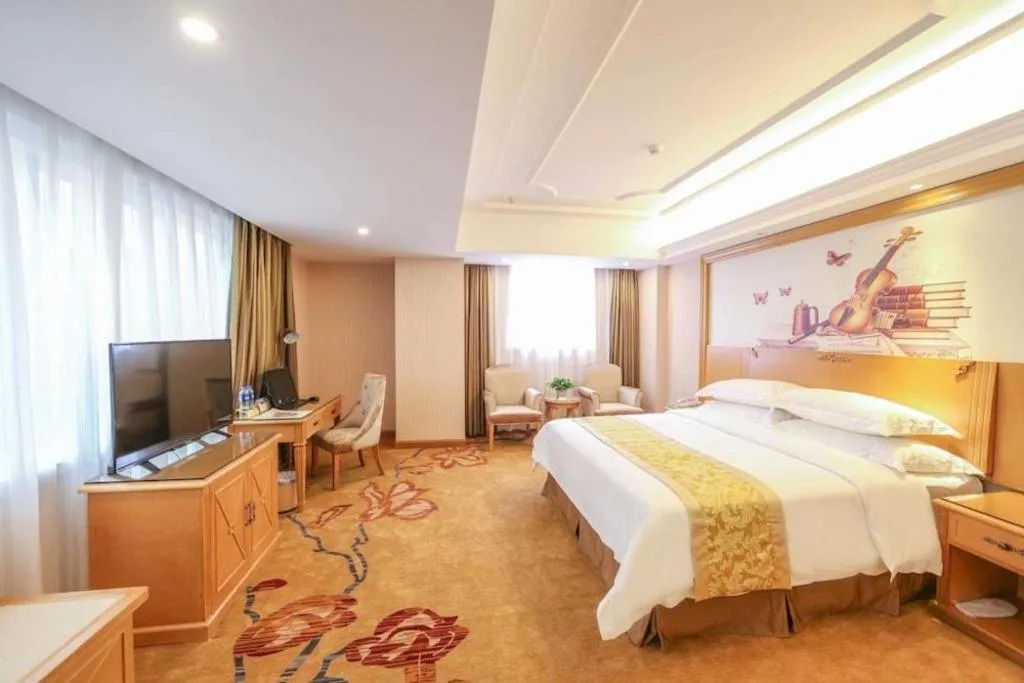Bed in Vienna Hotel Guangzhou Panyu Shiqiao Center Branch