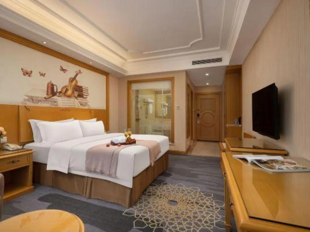 Bed in Vienna Hotel Guangzhou Panyu Shiqiao Center Branch