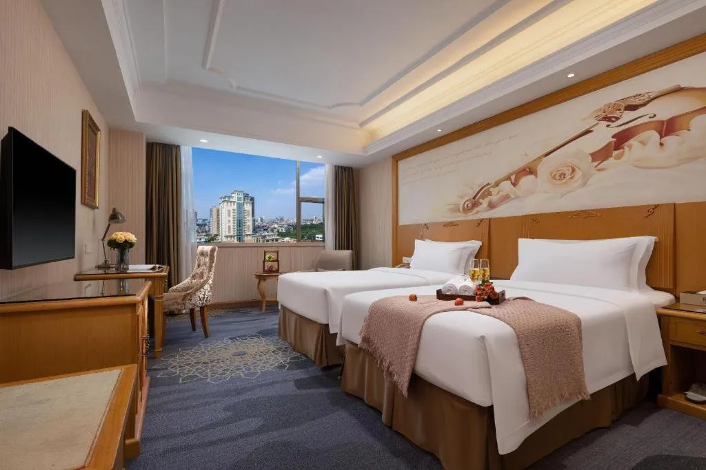 Bed in Vienna Hotel Guangzhou Panyu Shiqiao Center Branch