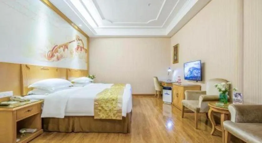 Bed in Vienna Hotel Guangzhou Panyu Shiqiao Center Branch