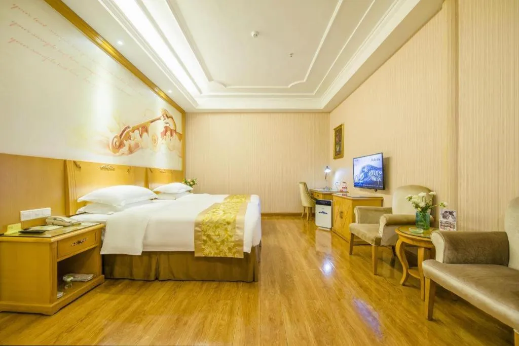 Bed in Vienna Hotel Guangzhou Panyu Shiqiao Center Branch
