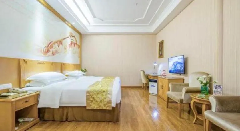Bed in Vienna Hotel Guangzhou Panyu Shiqiao Center Branch