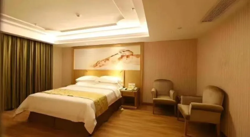 Bed in Vienna Hotel Guangzhou Panyu Shiqiao Center Branch