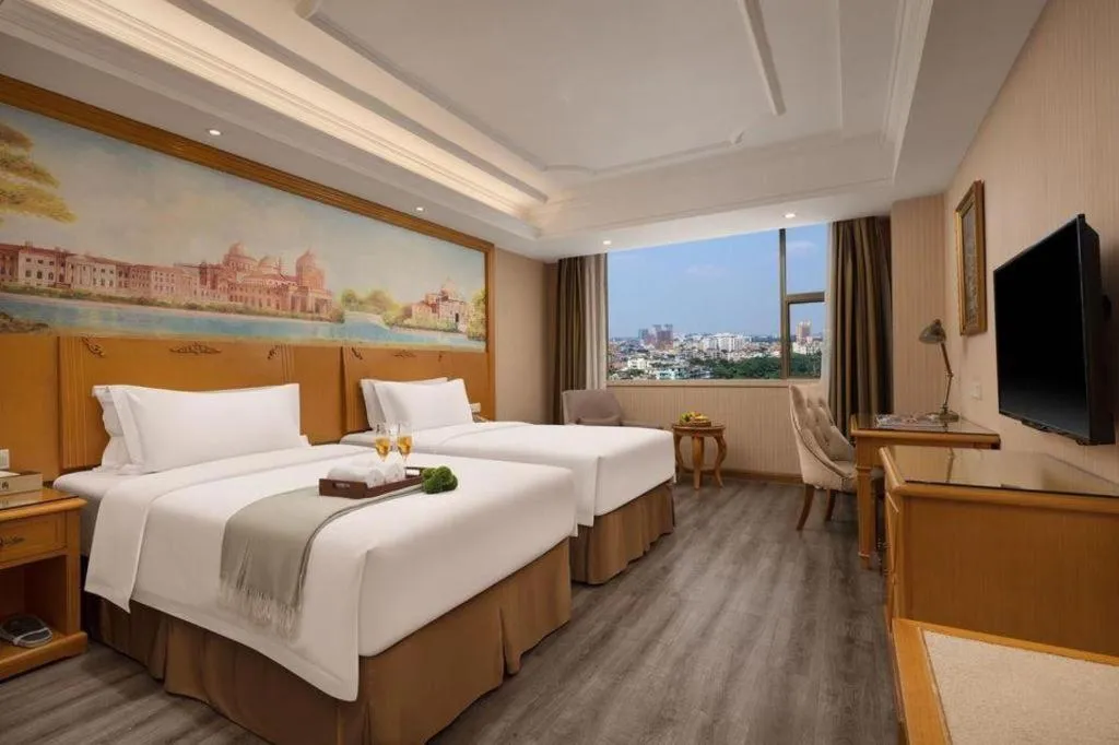 Bed in Vienna Hotel Guangzhou Panyu Shiqiao Center Branch