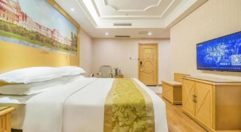 Bed in Vienna Hotel Guangzhou Panyu Shiqiao Center Branch