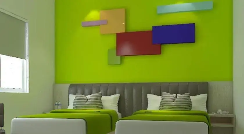 Bed in Zoom Dharmahusada Hotel Bed in Zoom Dharmahusada Hotel