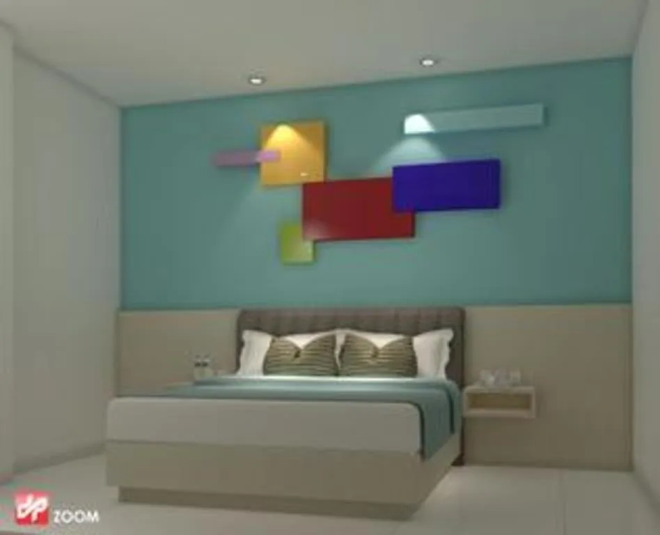 Bed in Zoom Dharmahusada Hotel