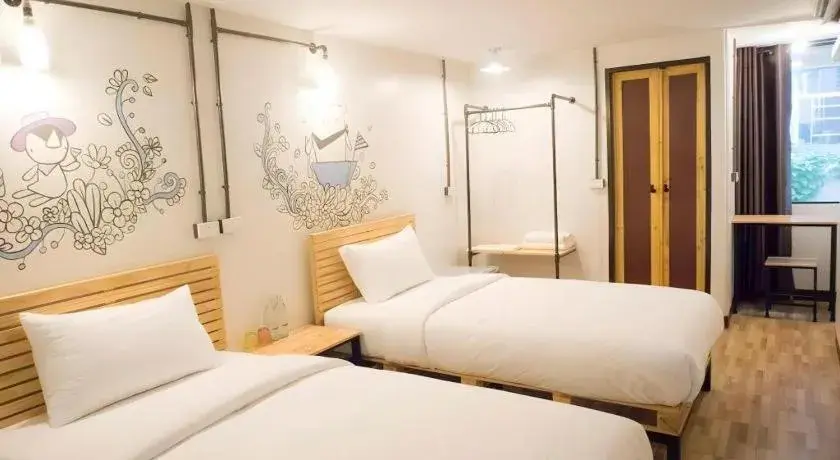 Bed in QBix Hotel Bed in QBix Hotel