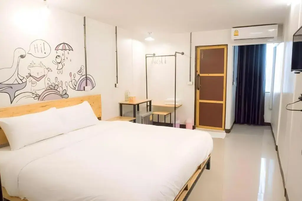 Bed in QBix Hotel Bed in QBix Hotel