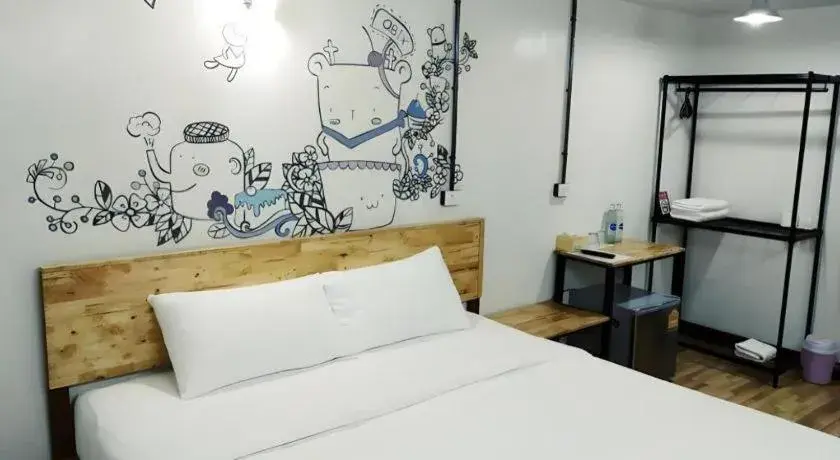 Bed in QBix Hotel Bed in QBix Hotel