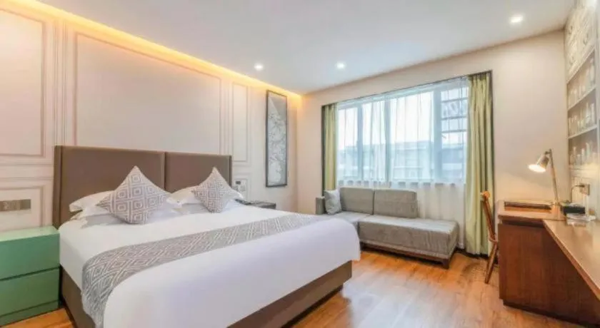 Bed in GEM Hotel Ningbo Tongtu Road Minglou Metro Station