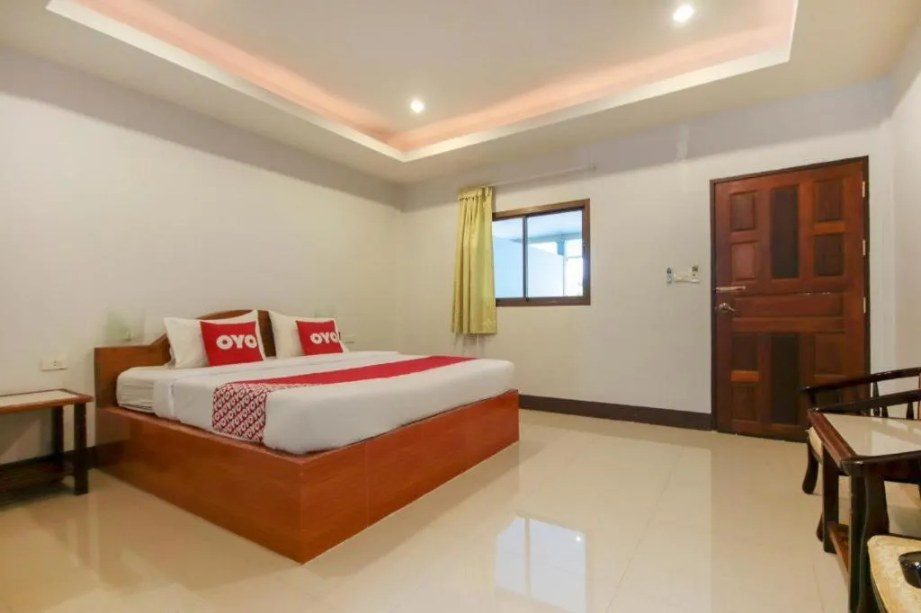 Bed in OYO 75310 Canalis Resort