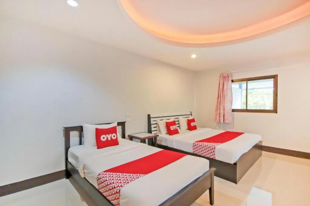 Bed in OYO 75310 Canalis Resort