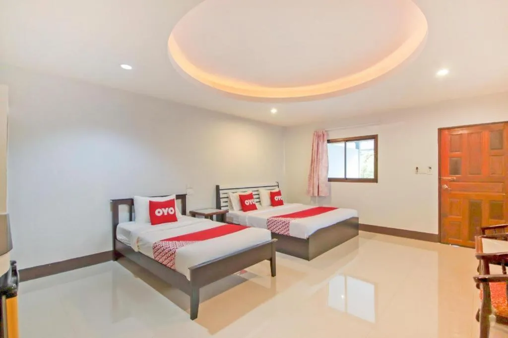 Bed in OYO 75310 Canalis Resort