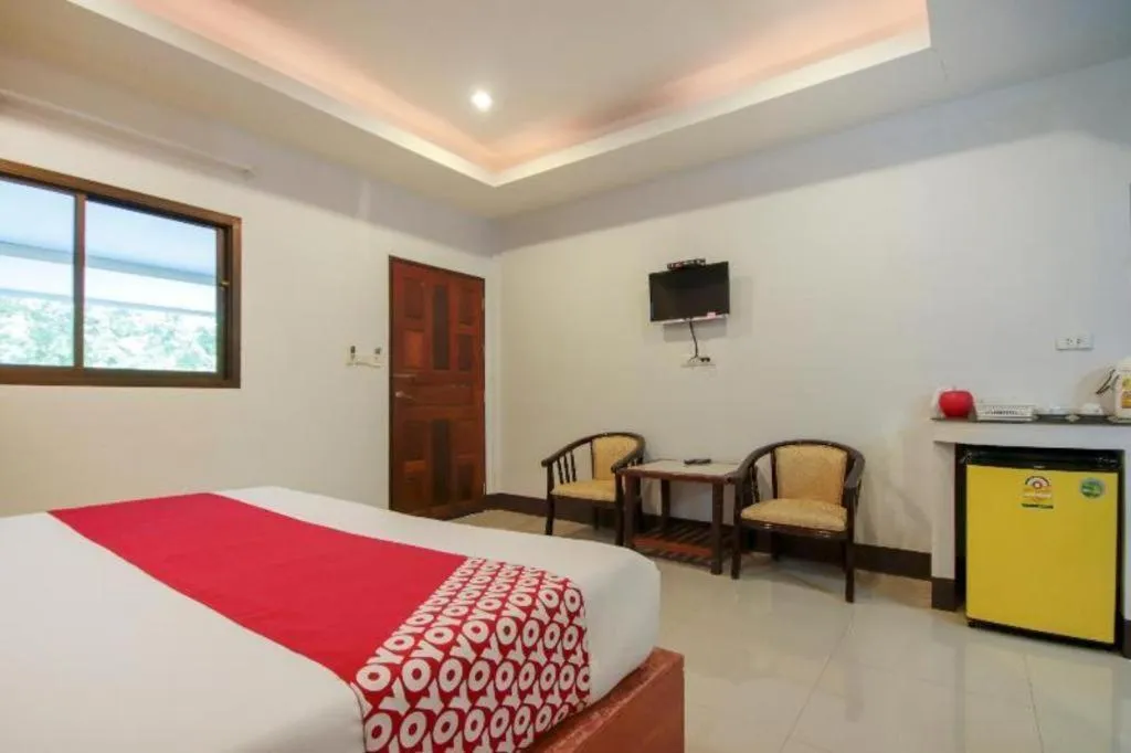 Bed in OYO 75310 Canalis Resort