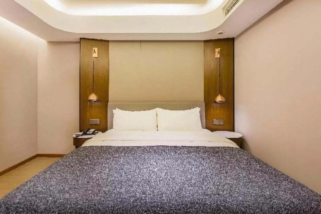 Bed in Yitel Collection Beijing Capital Airport New International Exhibition