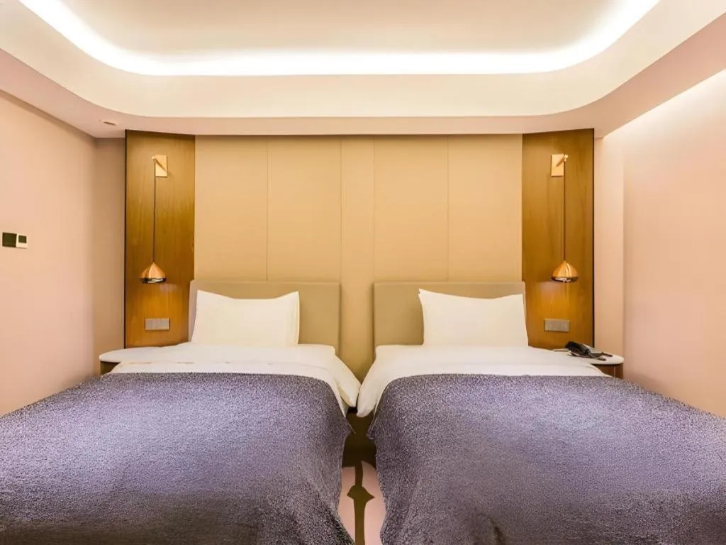 Bed in Yitel Collection Beijing Capital Airport New International Exhibition