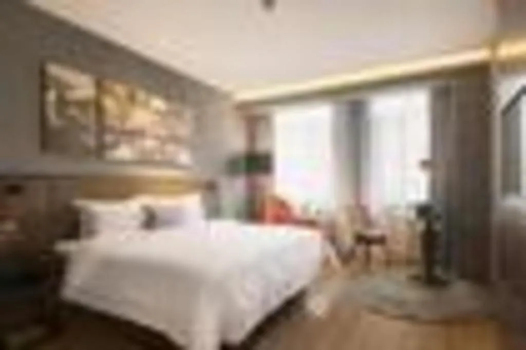 Bed in Yitel Collection Beijing Capital Airport New International Exhibition