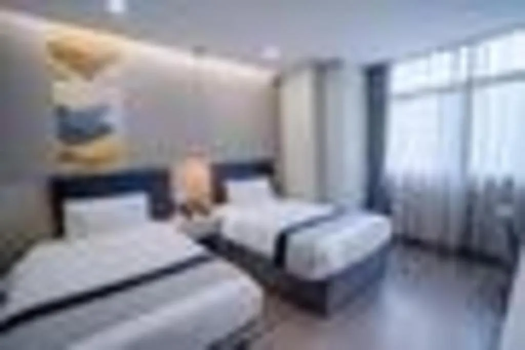 Bed in Yitel Collection Beijing Capital Airport New International Exhibition