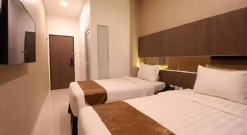 Bed in NIVIA HOTEL Bed in NIVIA HOTEL