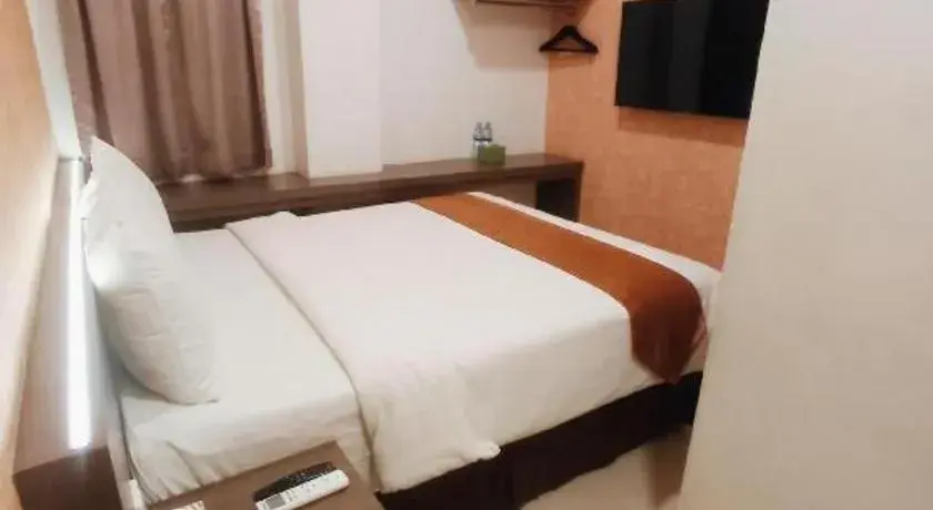 Bed in NIVIA HOTEL Bed in NIVIA HOTEL