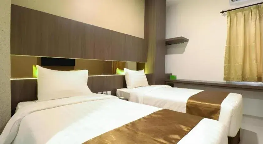 Bed in NIVIA HOTEL Bed in NIVIA HOTEL