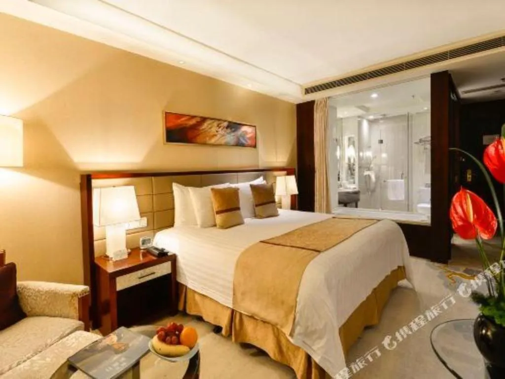 Bed in New Century Grand Hotel Lishui Huaqiao