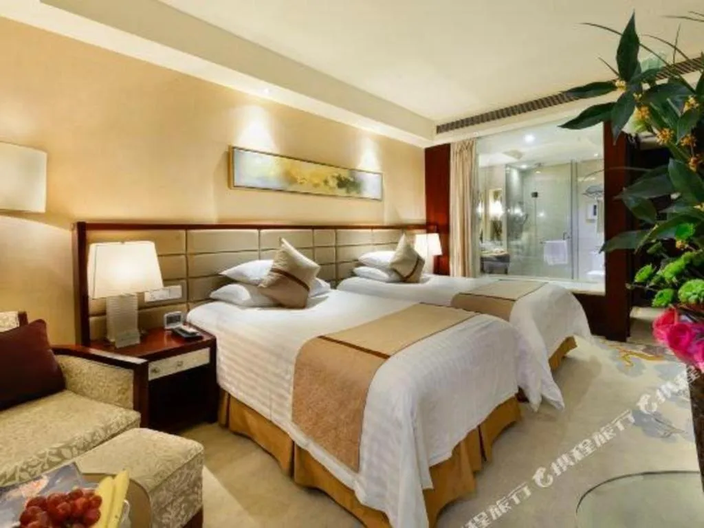 Bed in New Century Grand Hotel Lishui Huaqiao