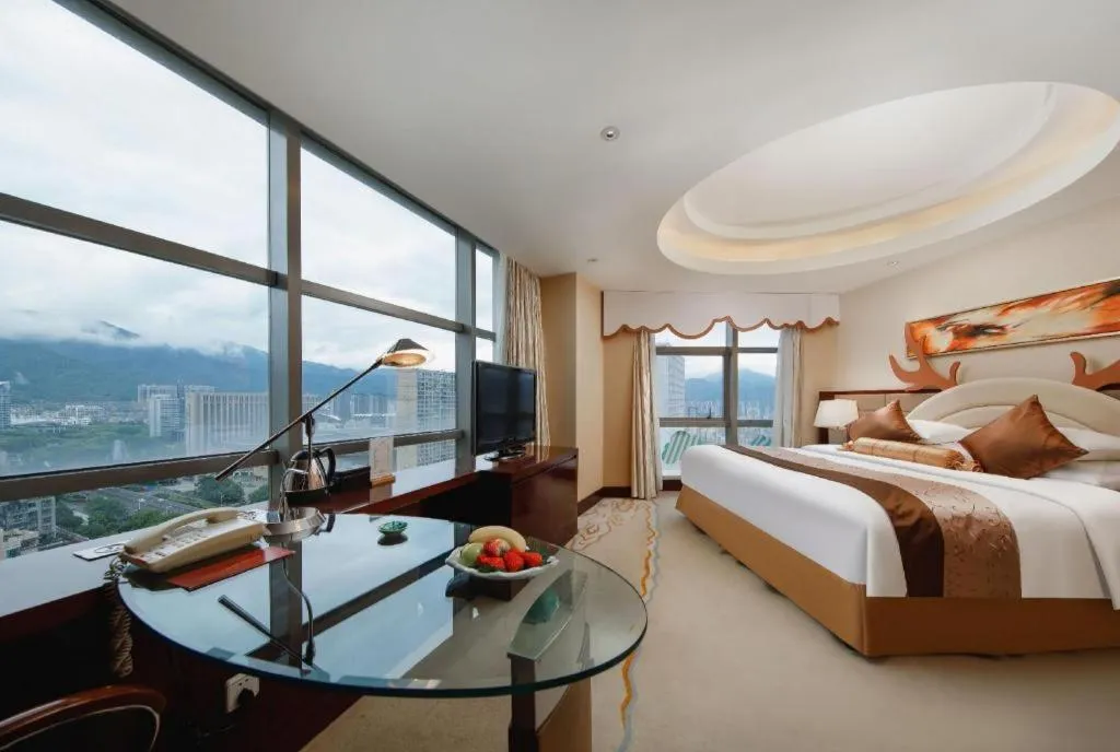 Bed in New Century Grand Hotel Lishui Huaqiao