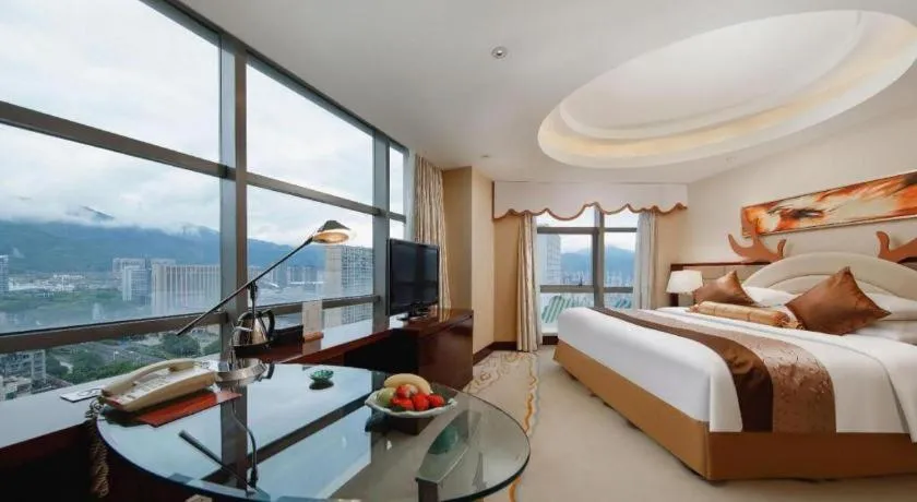 Bed in New Century Grand Hotel Lishui Huaqiao