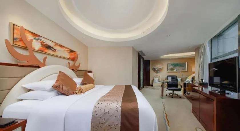 Bed in New Century Grand Hotel Lishui Huaqiao