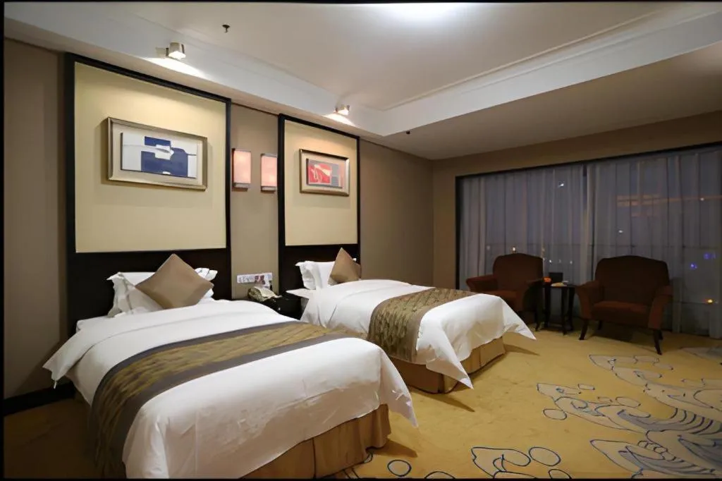 Bed in Qingdao Blue Horizon Hotel Laoshan