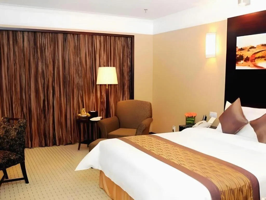 Bed in Qingdao Blue Horizon Hotel Laoshan