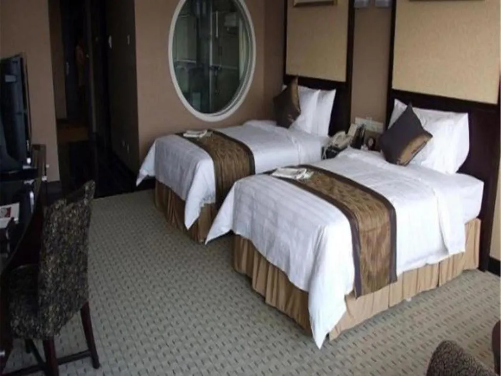 Bed in Qingdao Blue Horizon Hotel Laoshan