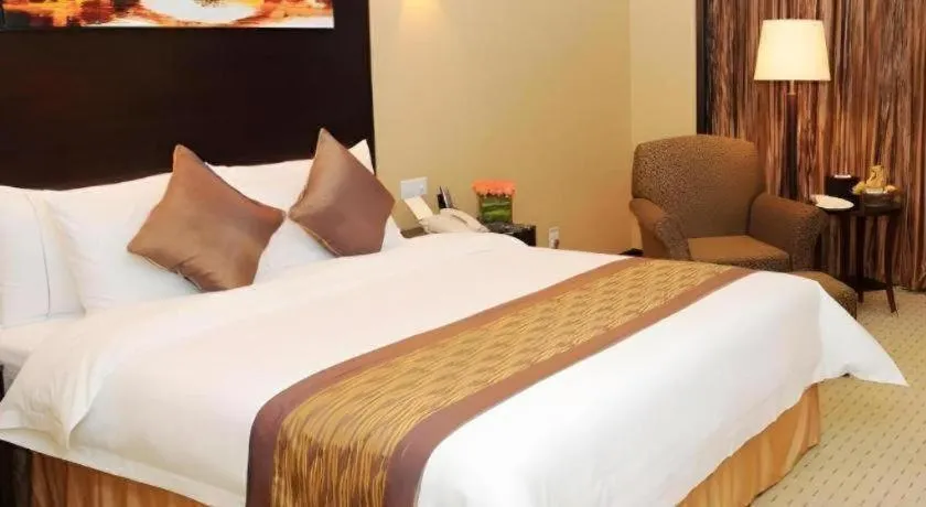 Bed in Qingdao Blue Horizon Hotel Laoshan