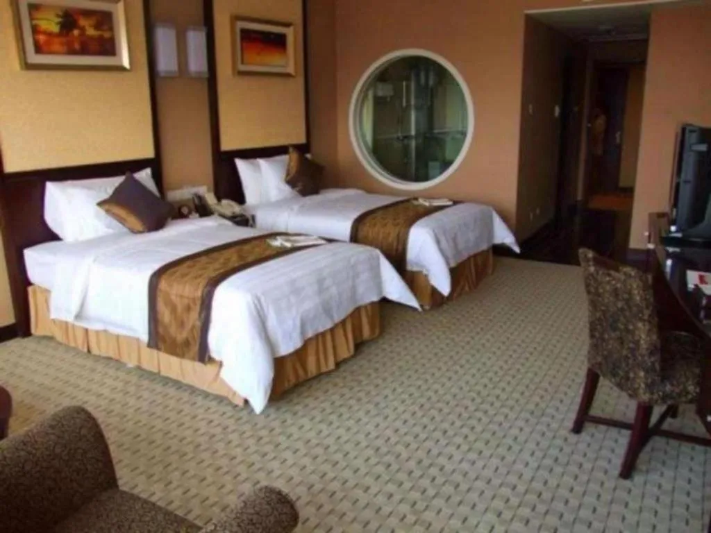 Bed in Qingdao Blue Horizon Hotel Laoshan