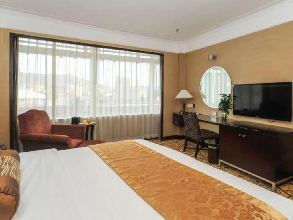 Bed in Qingdao Blue Horizon Hotel Laoshan