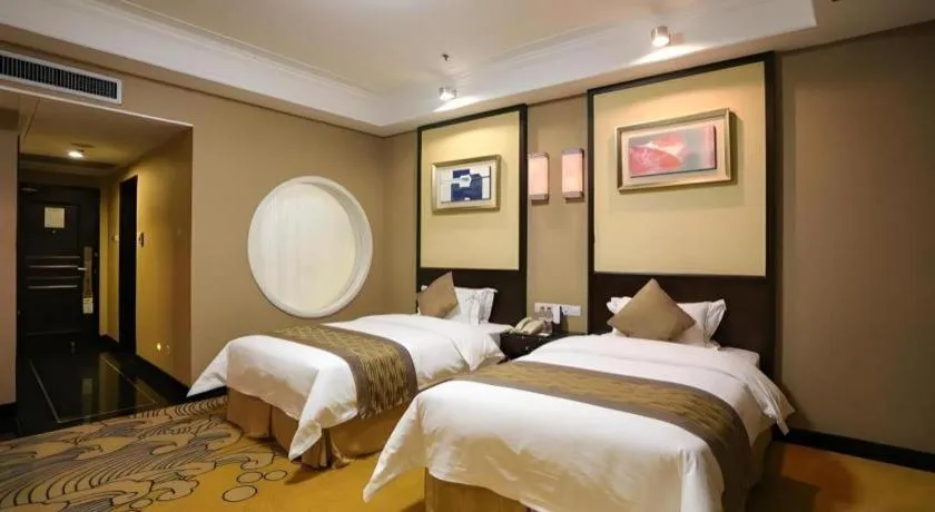 Bed in Qingdao Blue Horizon Hotel Laoshan