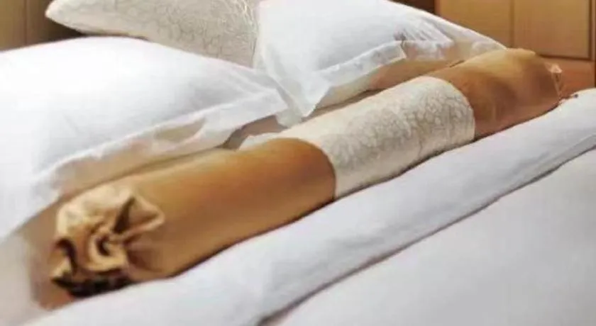 Bed in Holiday Inn Hotel & Suites Jiaxing Hangzhou Bay By IHG