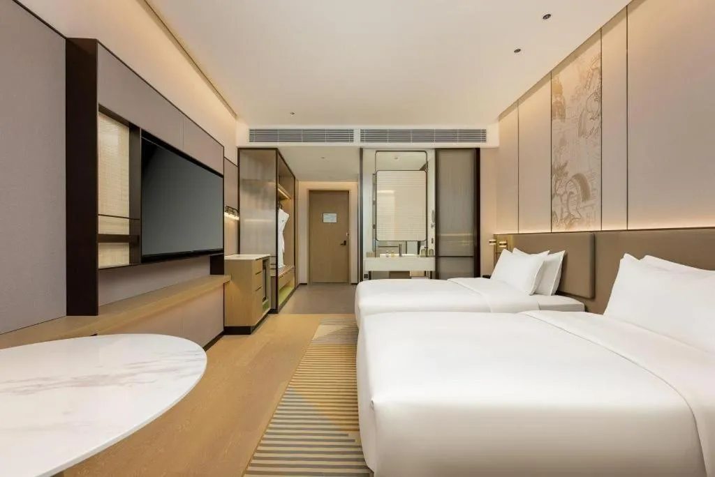 Bed in Holiday Inn Hotel & Suites Jiaxing Hangzhou Bay By IHG