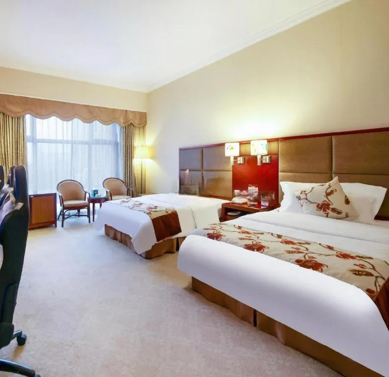 Bed in Dolton Changsha Spa Hotel