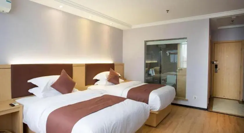 Bed in GYA Hotel Shanghai Songjiang Wanda Plaza Bed in GYA Hotel Shanghai Songjiang Wanda Plaza