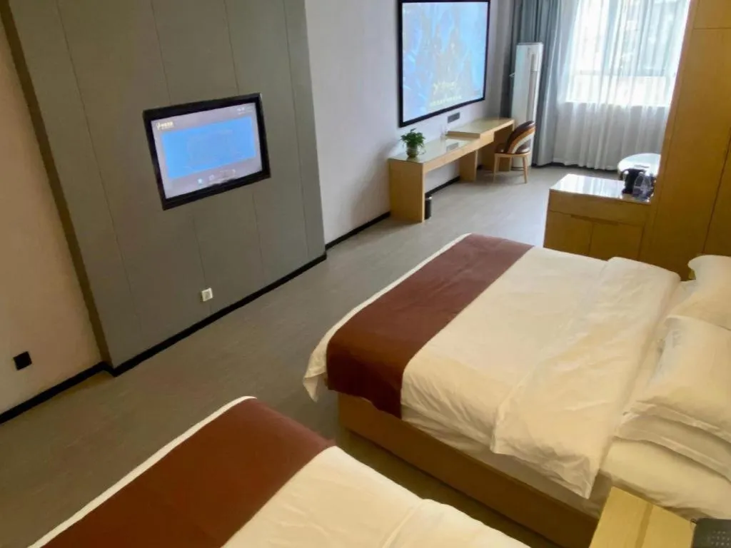 Bed in GYA Hotel Shanghai Songjiang Wanda Plaza