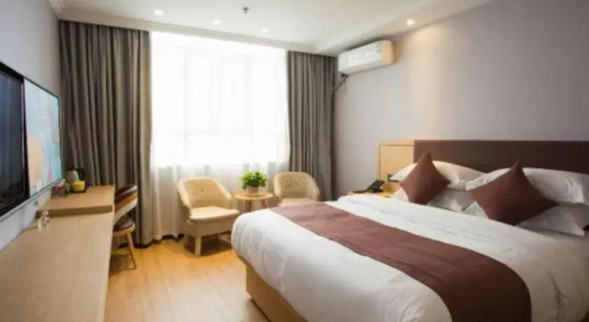 Bed in GYA Hotel Shanghai Songjiang Wanda Plaza Bed in GYA Hotel Shanghai Songjiang Wanda Plaza